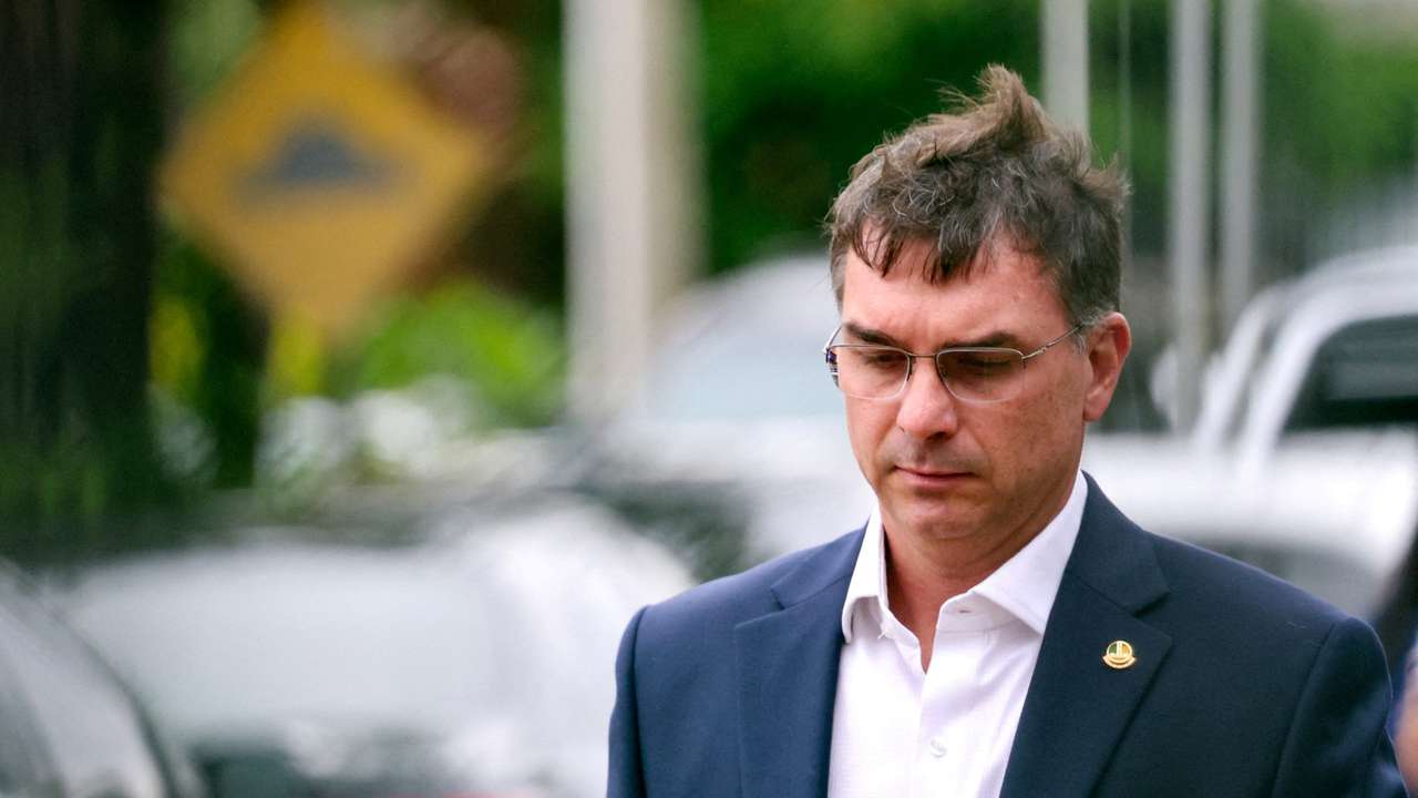 FILE PHOTO: Brazil's former President Jair Bolsonaro remains in custody after an ankle monitor breach while on house arrest, in Brasilia