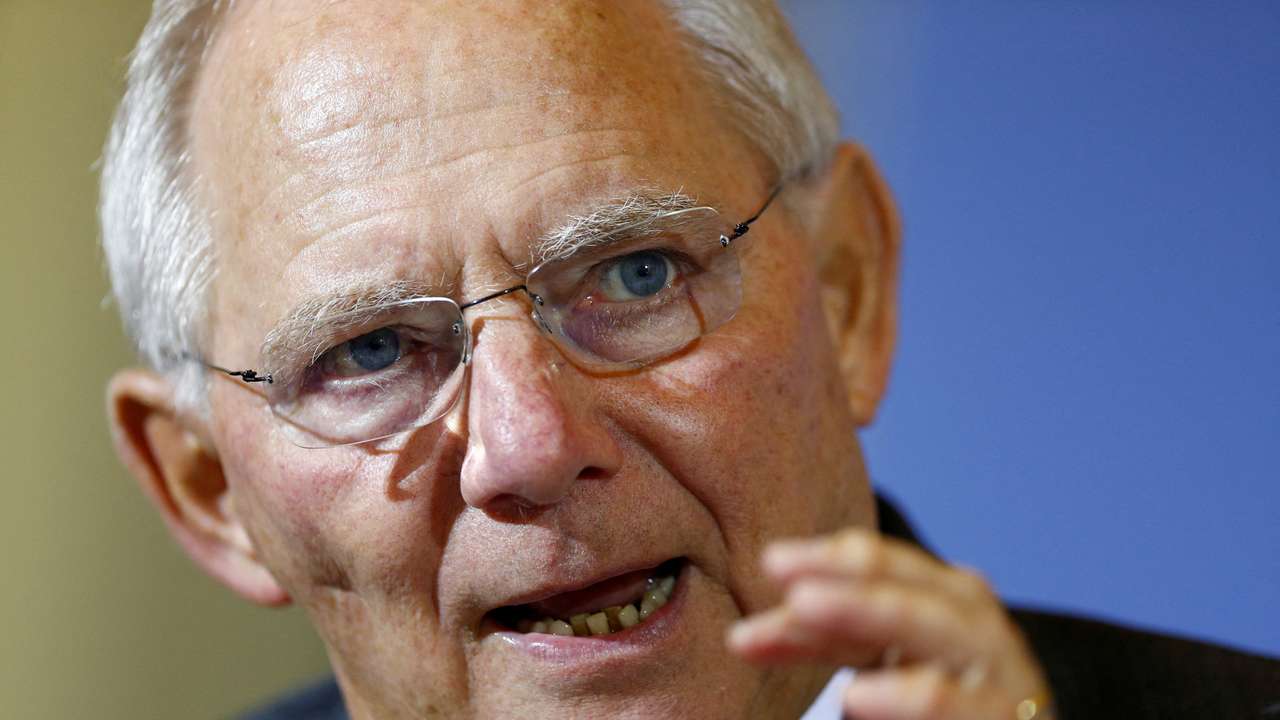 FILE PHOTO: German Finance Minister Schaeuble gestures as he attends a meeting in Berlin