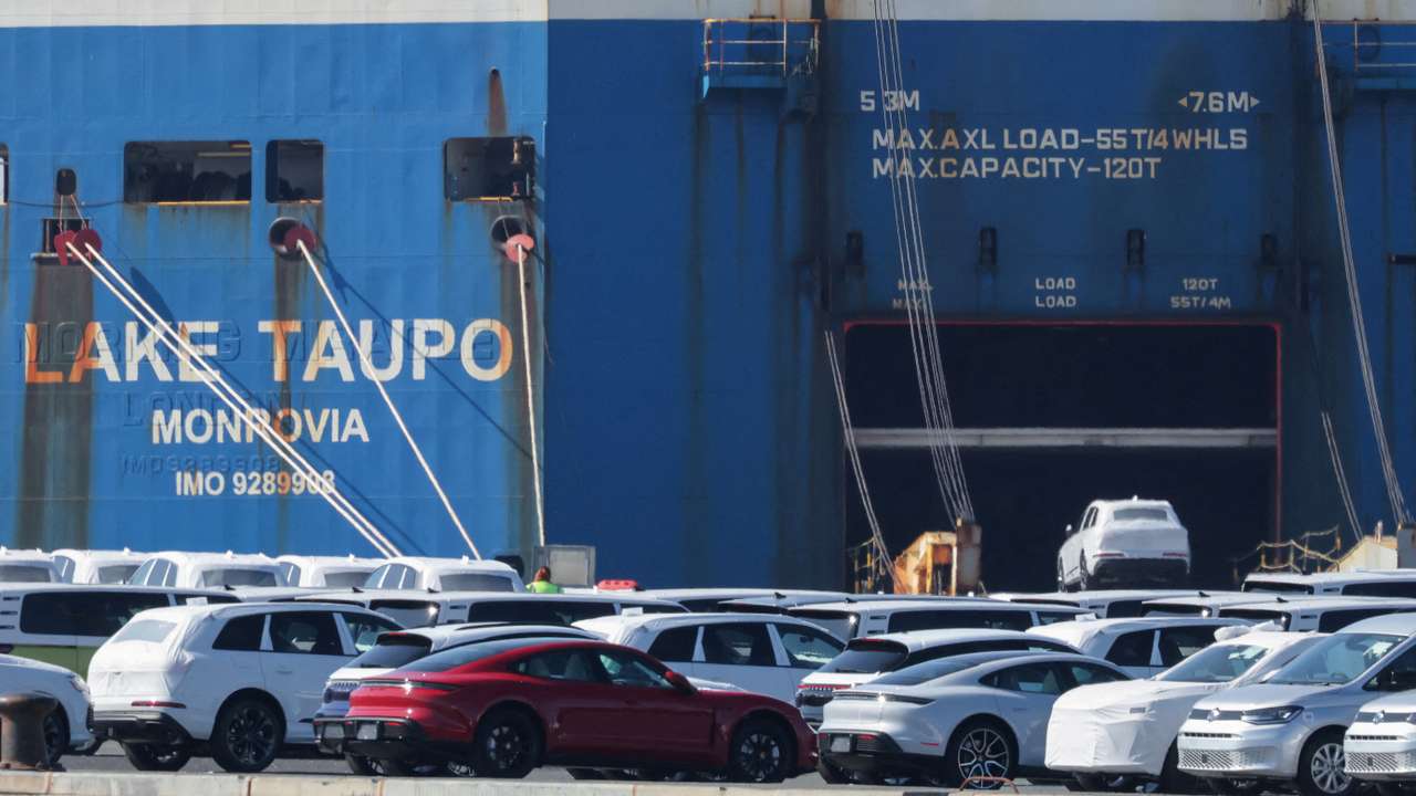 FILE PHOTO: Cars of the Volkswagen Group are waiting to be exported to the US from the seaport of Emden