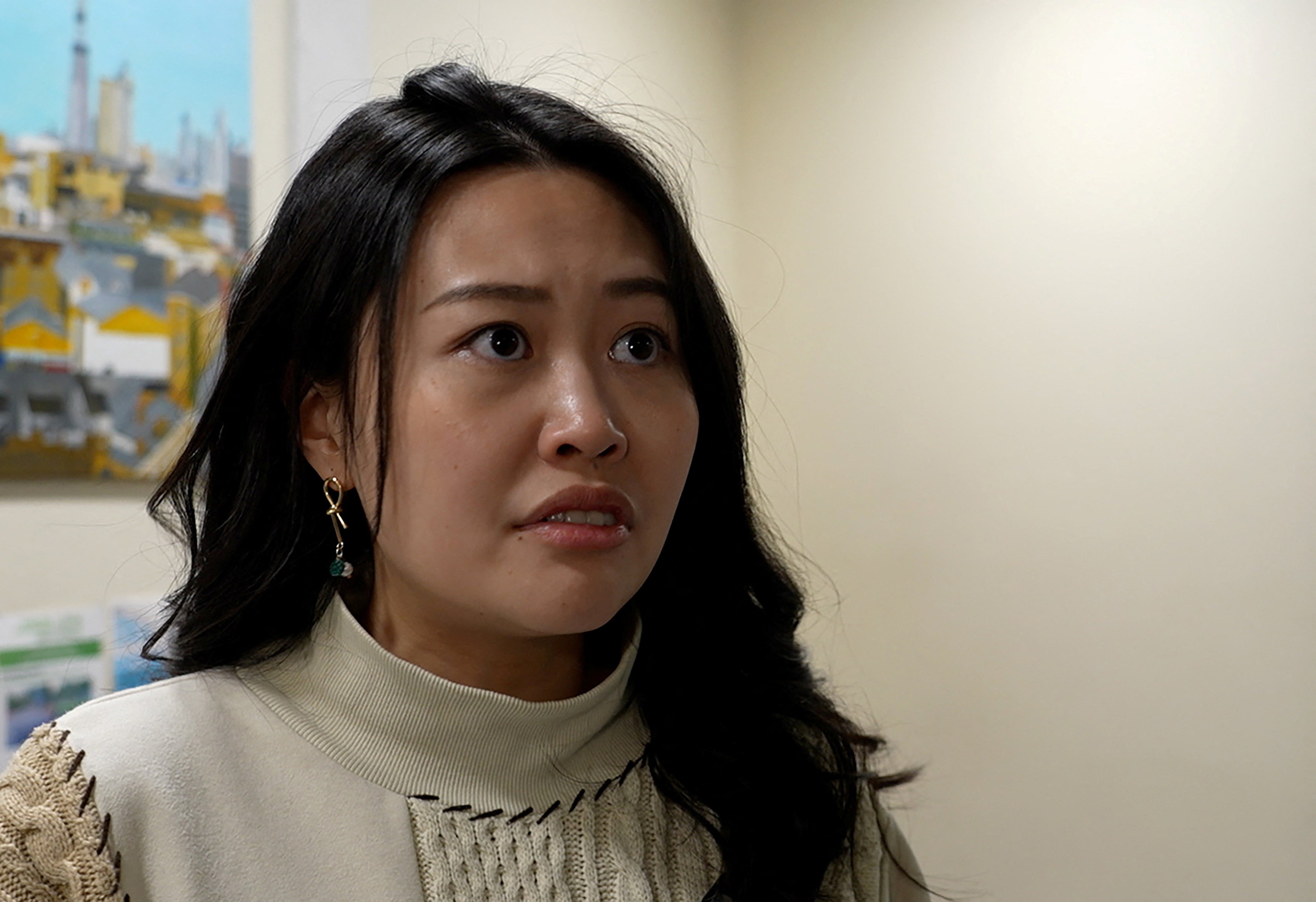Exiled Hong Kong democracy activist Lau speaks during interview with Reuters in this still image taken from video, in London