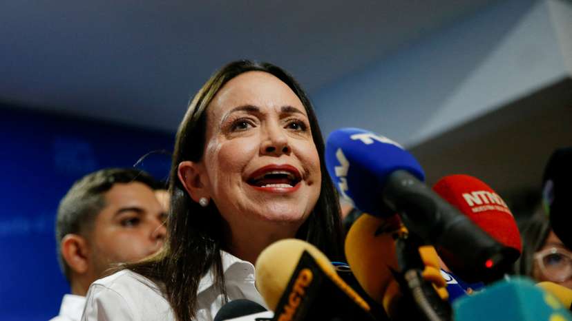 Opposition leader Maria Corina Machado addresses the media, in Caracas