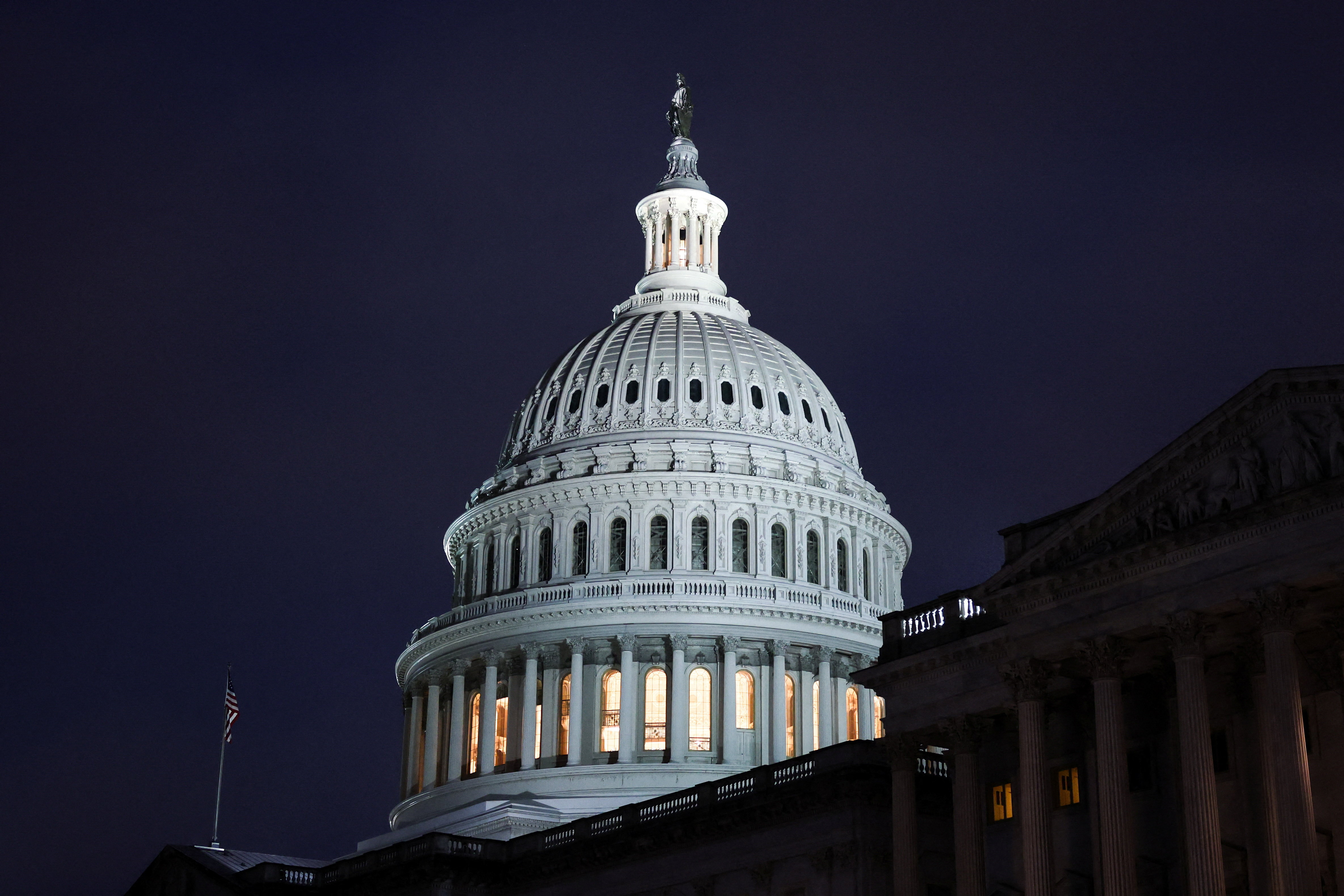 A view of the U.S. Capitol building at night in Washington