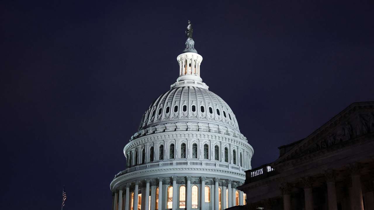 A view of the U.S. Capitol building at night in Washington