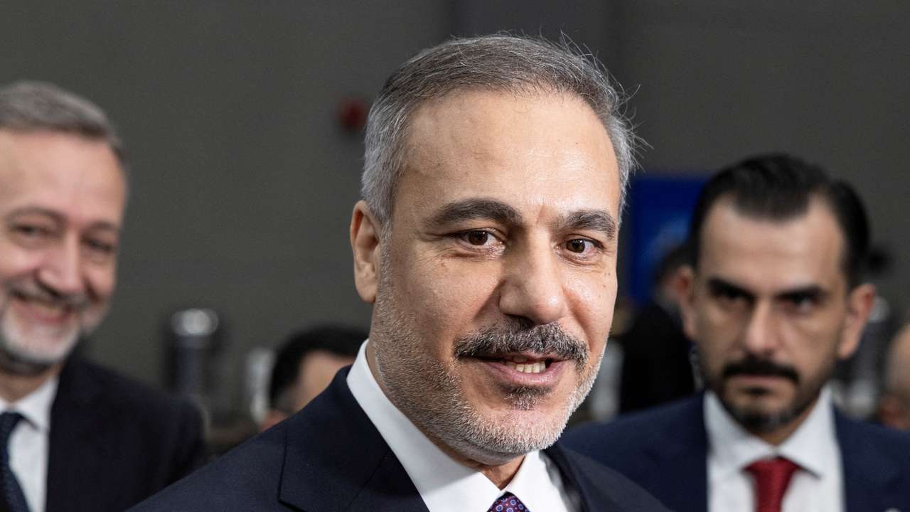 FILE PHOTO: Turkish Foreign Minister Hakan Fidan chats with press members ahead of the NATO Foreign Ministers Meeting in Antalya