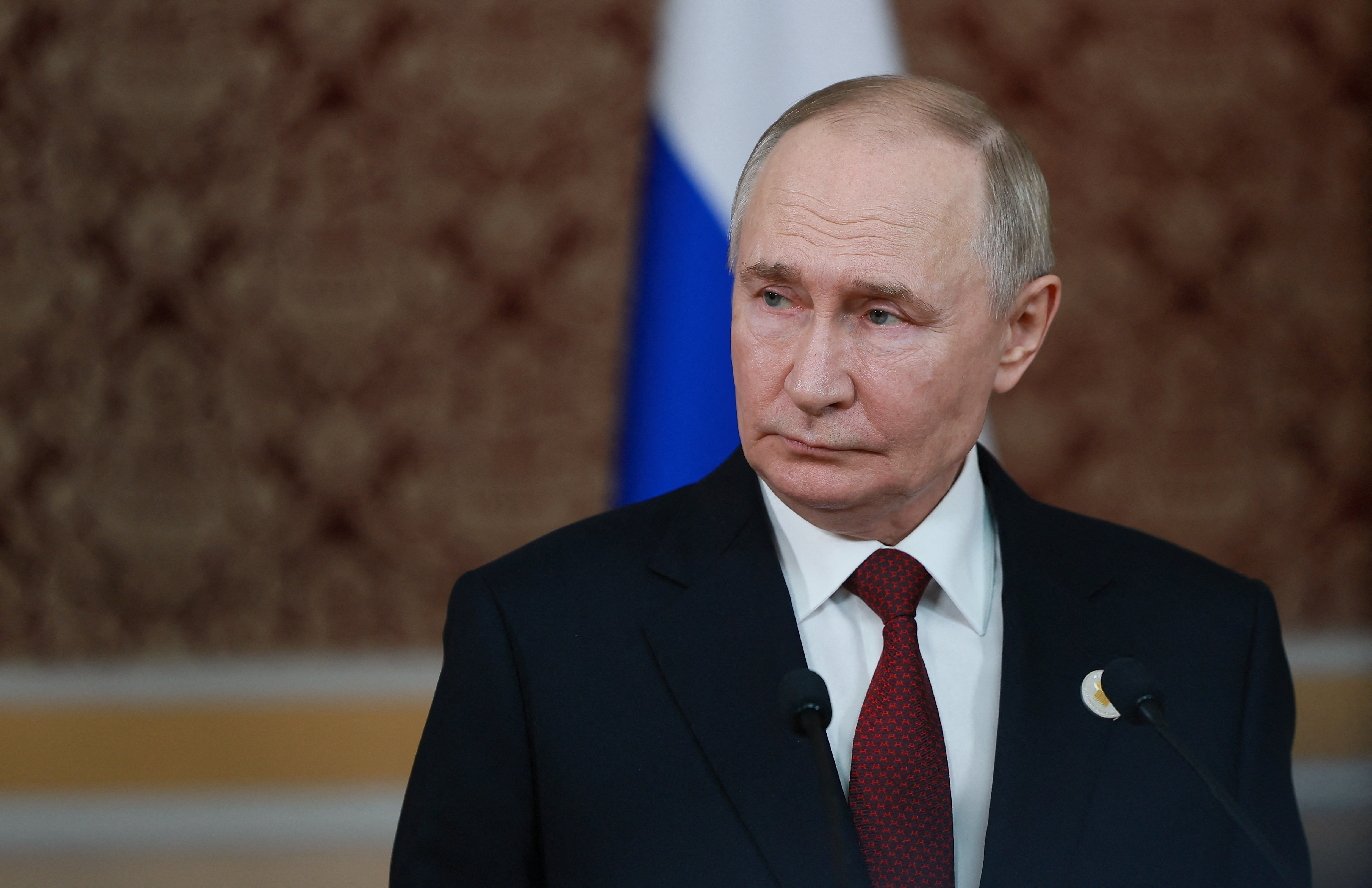 Russian President Putin attends a press conference in Dushanbe