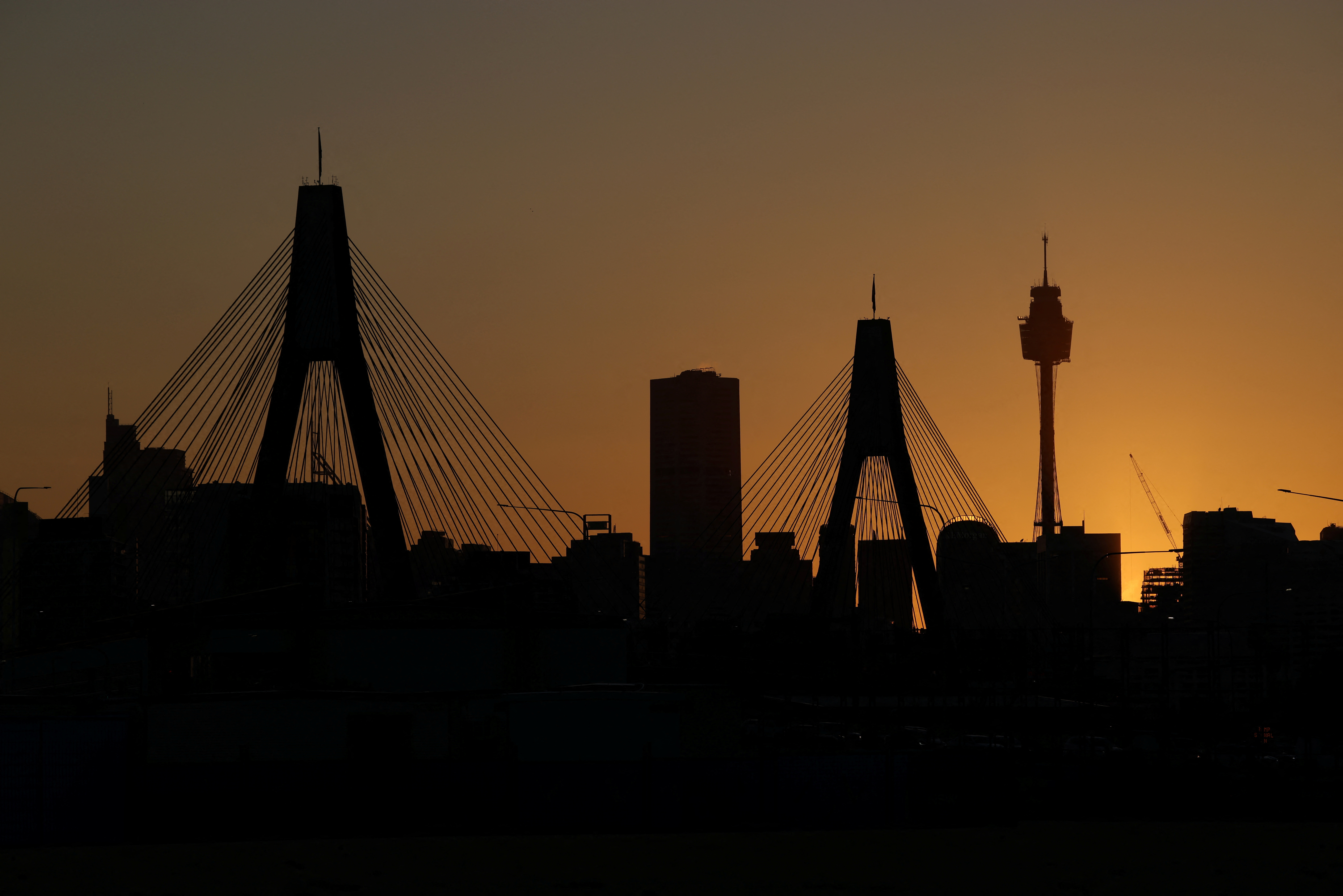 The sun rises over the Sydney Tower Eye