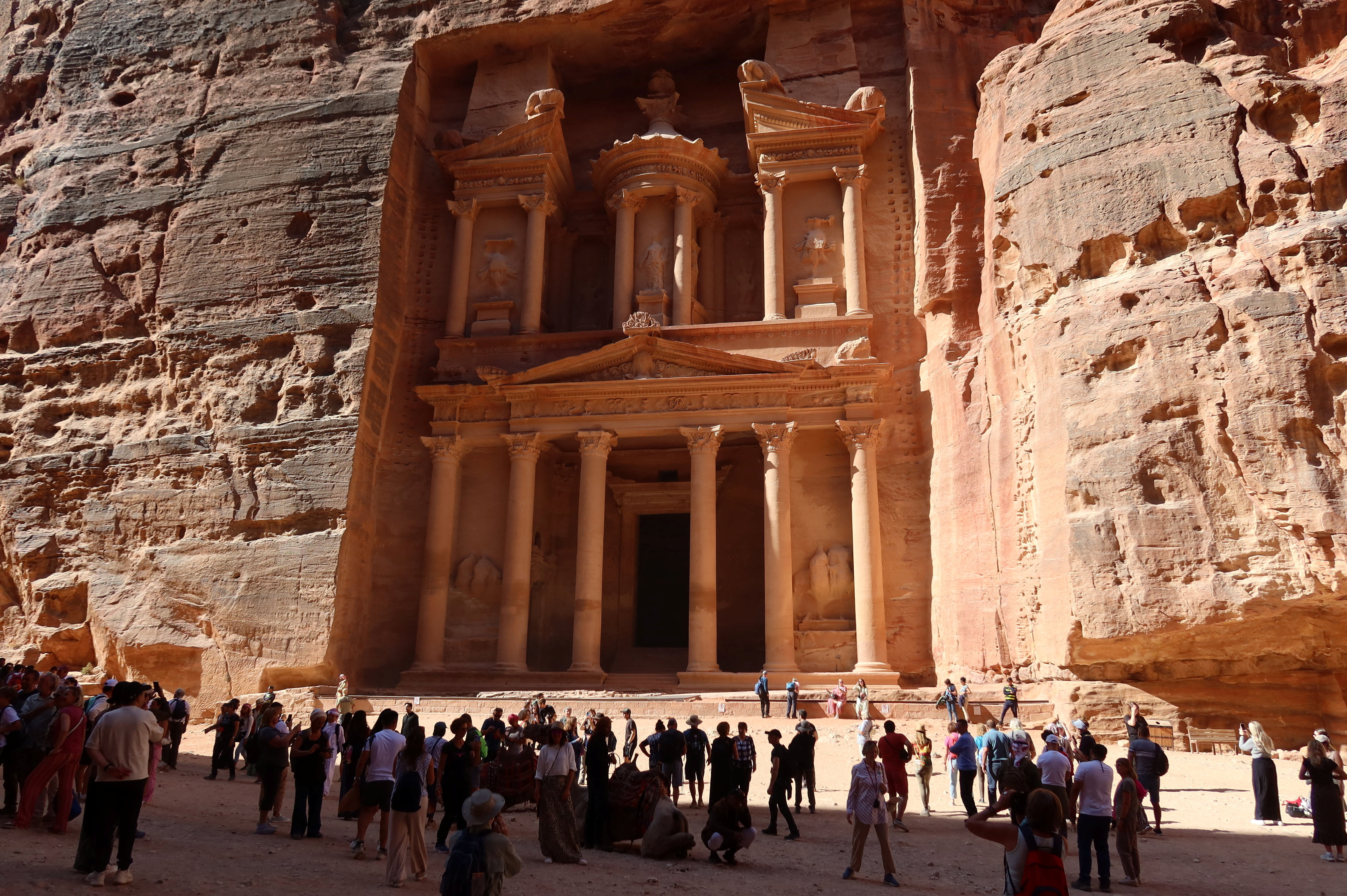 Visitors gather at the treasury site in the ancient city of Petra