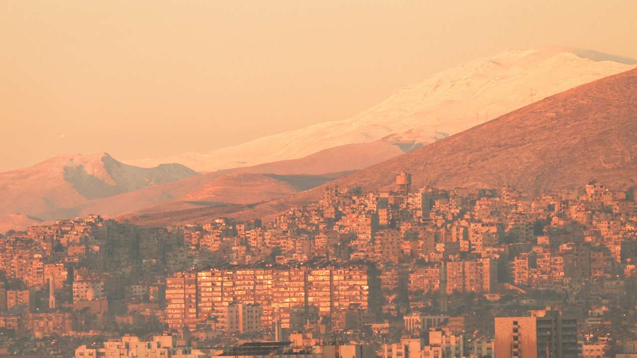 FILE PHOTO: A general view of the city during the year's first sunrise on New Year's Day, in Damascus