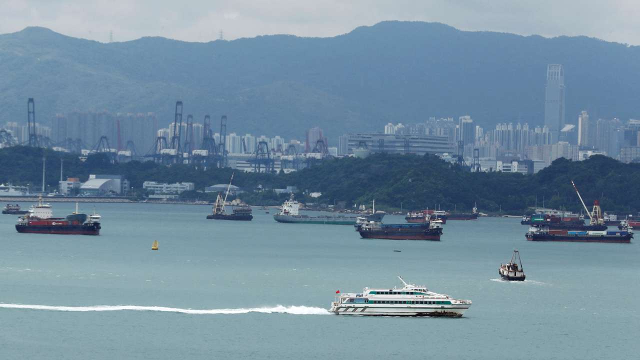 FILE PHOTO: General view of the city of Hong Kong is seen through a window of the Observation Wheel