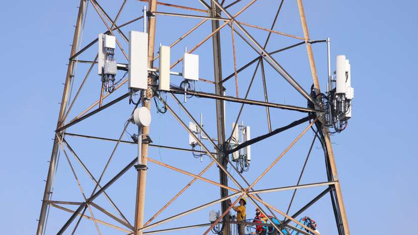 Technicians install 5G equipment in California