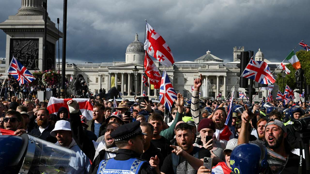 Anti-racism protesters gather to counter anti-immigration rally led by Tommy Robinson, in London