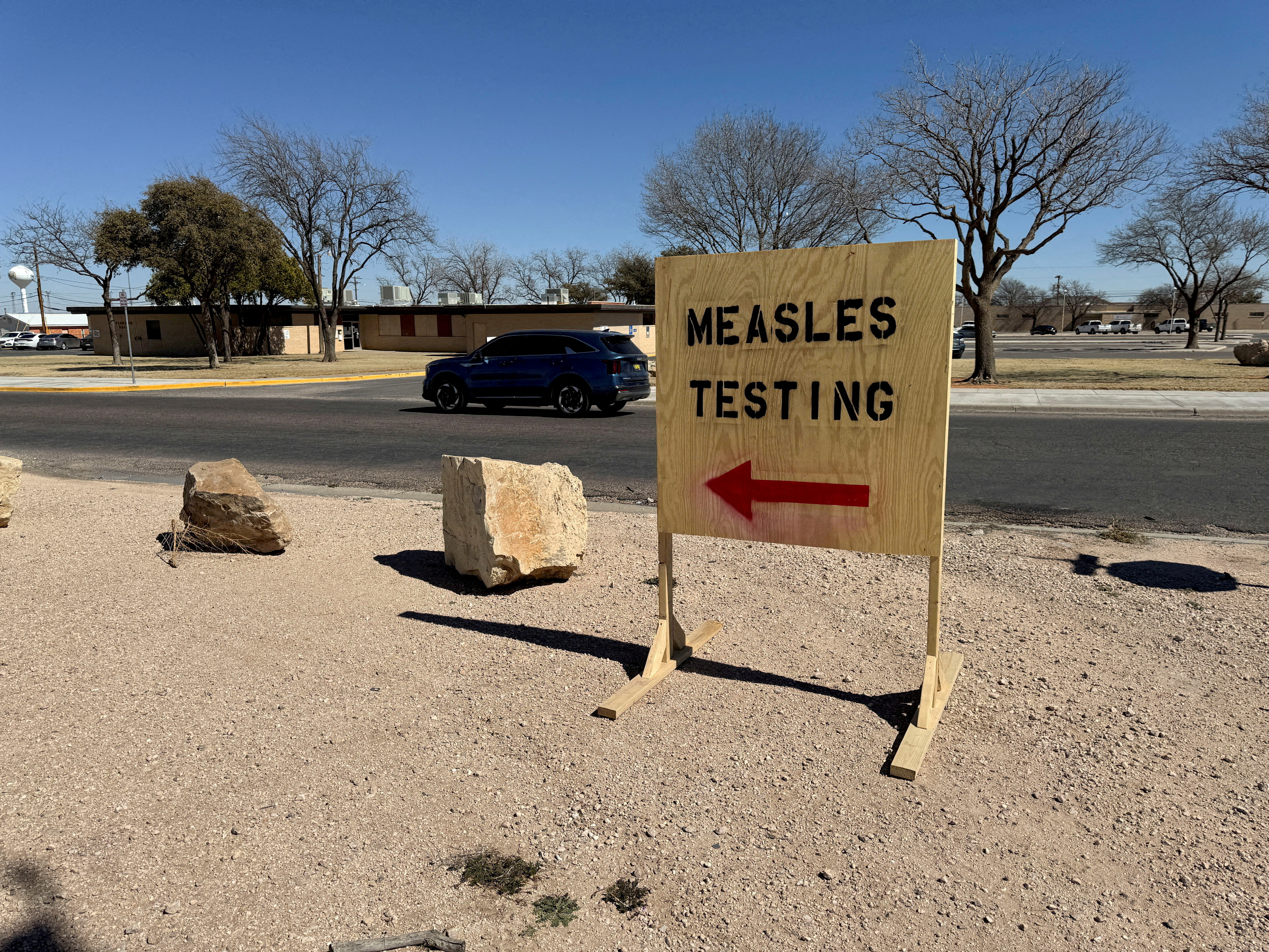 FILE PHOTO: A sign for measles testing is seen in Texas