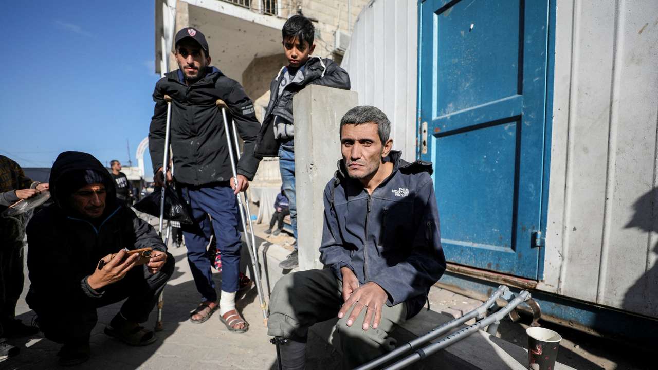 Wounded Palestinians arrive at Al-Ahli al-Arabi hospital, in Gaza City