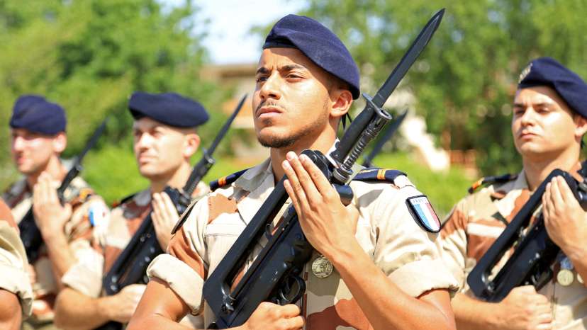 FILE PHOTO: French soldiers stand at attention during a morning drill at the French military base in Chadian capital N'Djamena