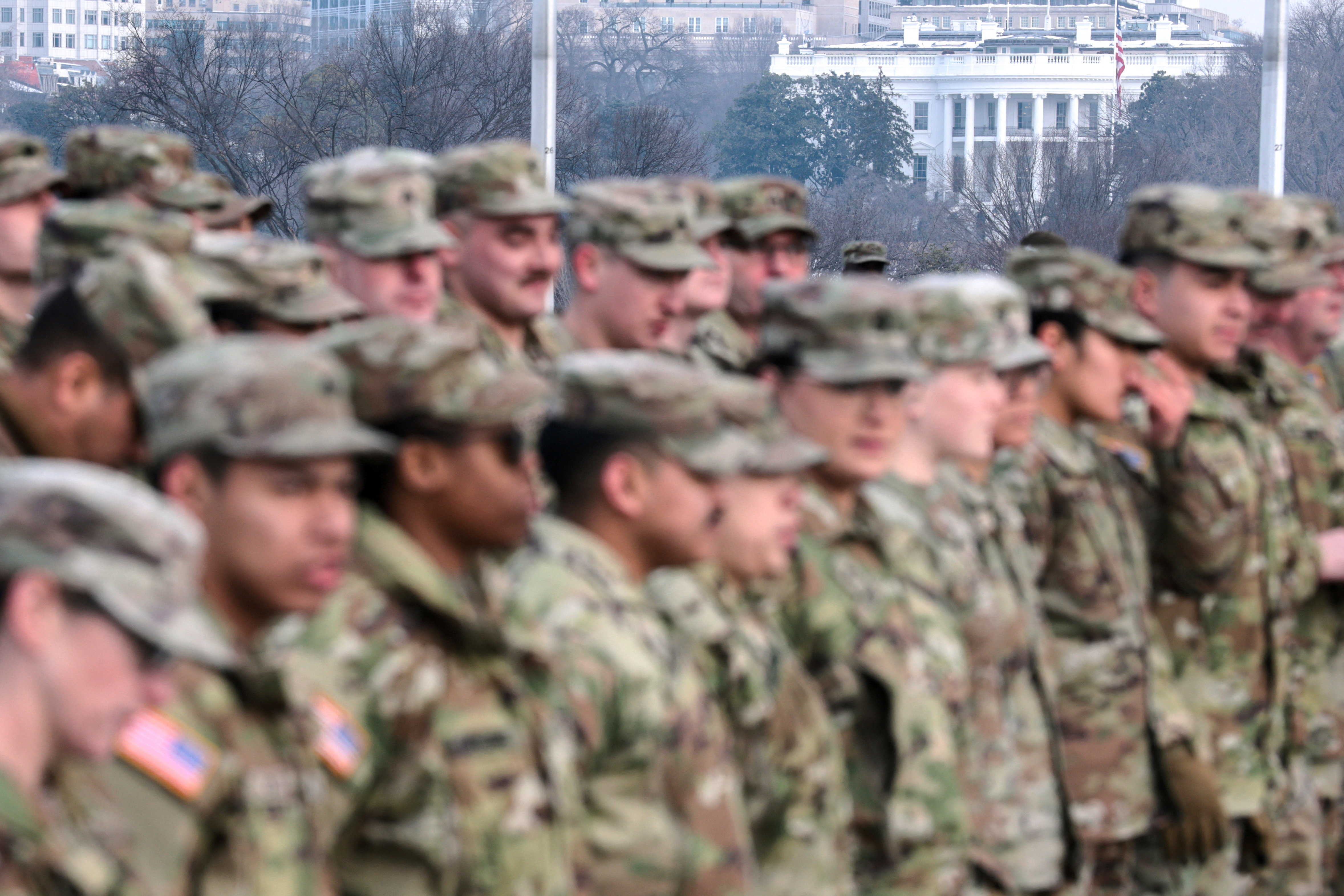 U.S. Defense Secretary Hegseth administers the oath during a U.S. Army National Guard re-enlistment ceremony at the Washington Monument