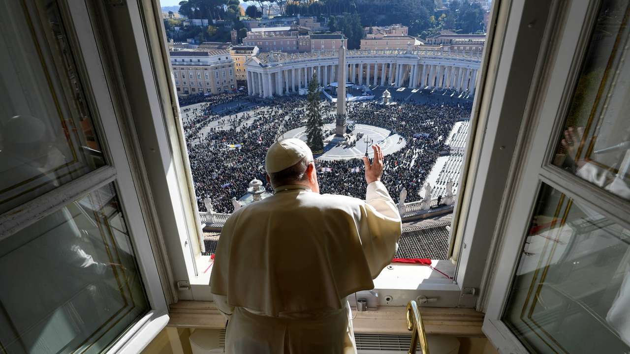 Pope Francis leads the Angelus prayer from his window, at the Vatican