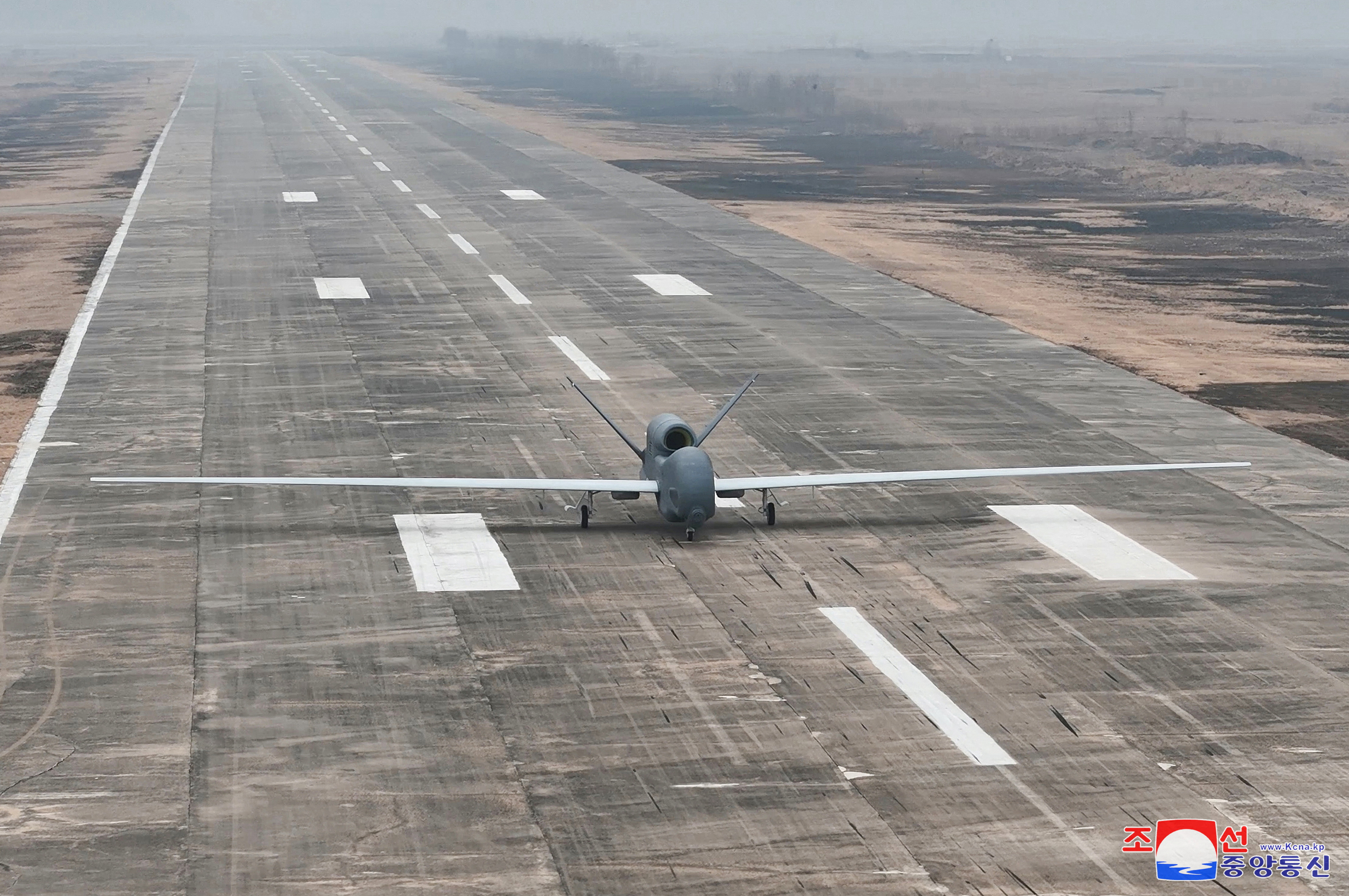 A suicide drone equipped with artificial intelligence (AI) technology is pictured on a runway, on the day North Korean leader Kim Jong Un guides defense science research projects
