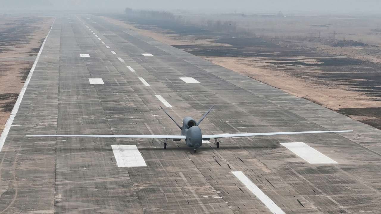 A suicide drone equipped with artificial intelligence (AI) technology is pictured on a runway, on the day North Korean leader Kim Jong Un guides defense science research projects