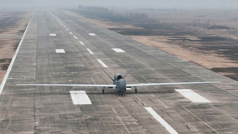 A suicide drone equipped with artificial intelligence (AI) technology is pictured on a runway, on the day North Korean leader Kim Jong Un guides defense science research projects