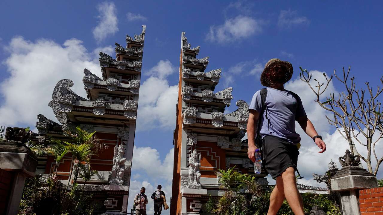 Passengers arrive at the I Gusti Ngurah Rai International Airport in Badung, Bali