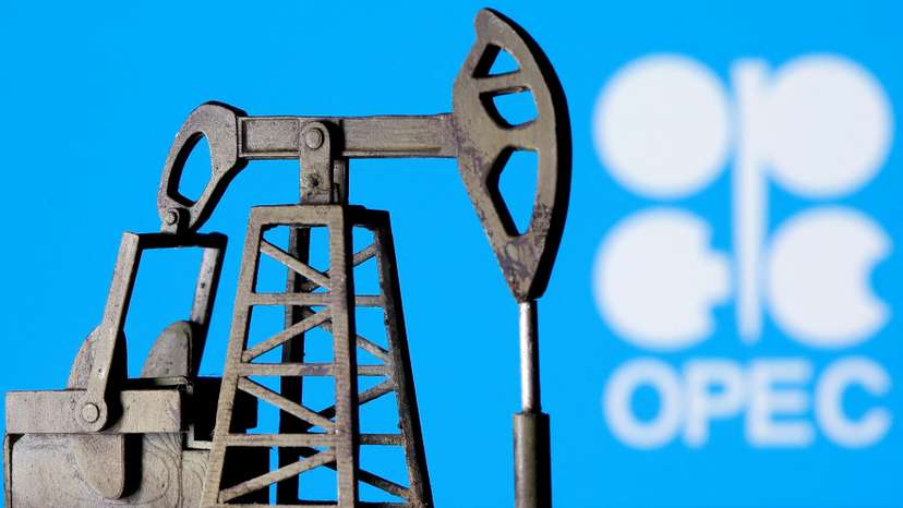 FILE PHOTO: A 3D printed oil pump jack is seen in front of displayed Opec logo in this illustration picture