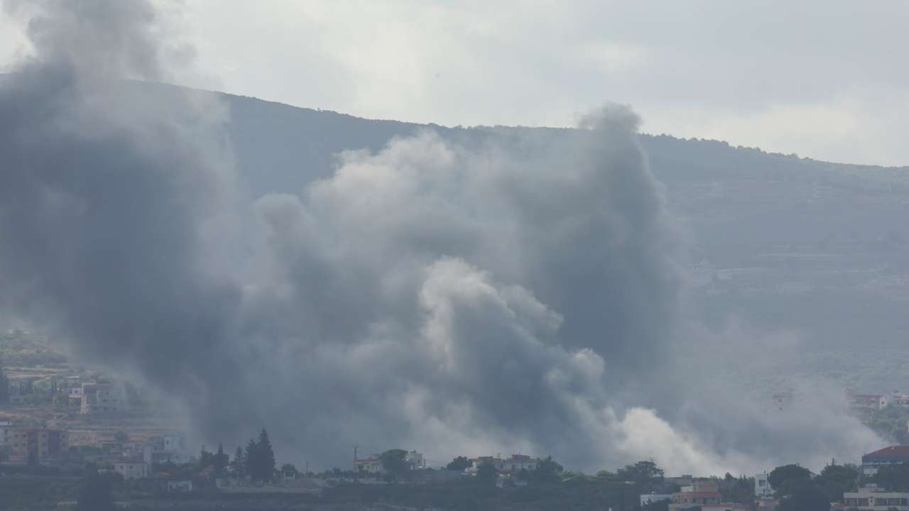 Smoke billows amid the ongoing hostilities between Hezbollah and Israeli forces, as seen from Tyre