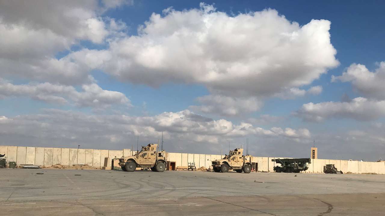 Military vehicles of U.S. soldiers are seen at Ain al-Asad air base in Anbar province