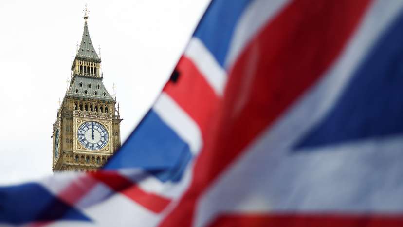 The Union Jack flag is flown outside the Houses of Parliament in London