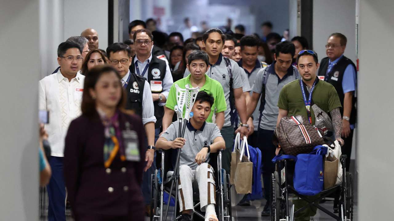 Filipino seafarers who survived the deadly Houthi attack on the commercial ship True Confidence arrive at Manila International Airport