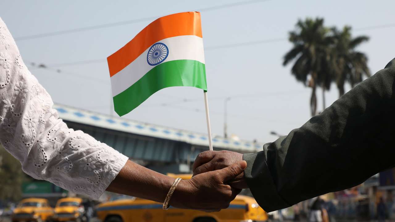 Demonstrators form a human chain after Republic Day celebrations to protest against a new citizenship law in Kolkata
