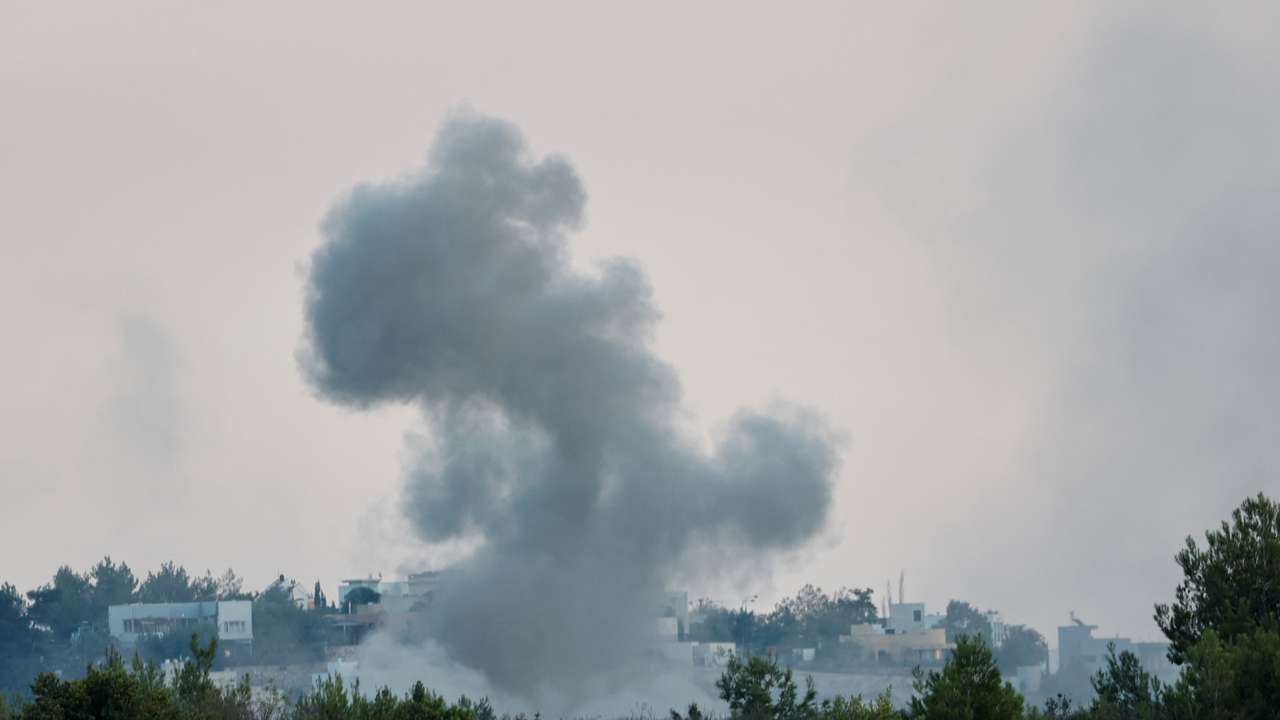 Smoke rises after Israeli shelling , as seen from Lebanese side, near the border with Israel, southern Lebanon