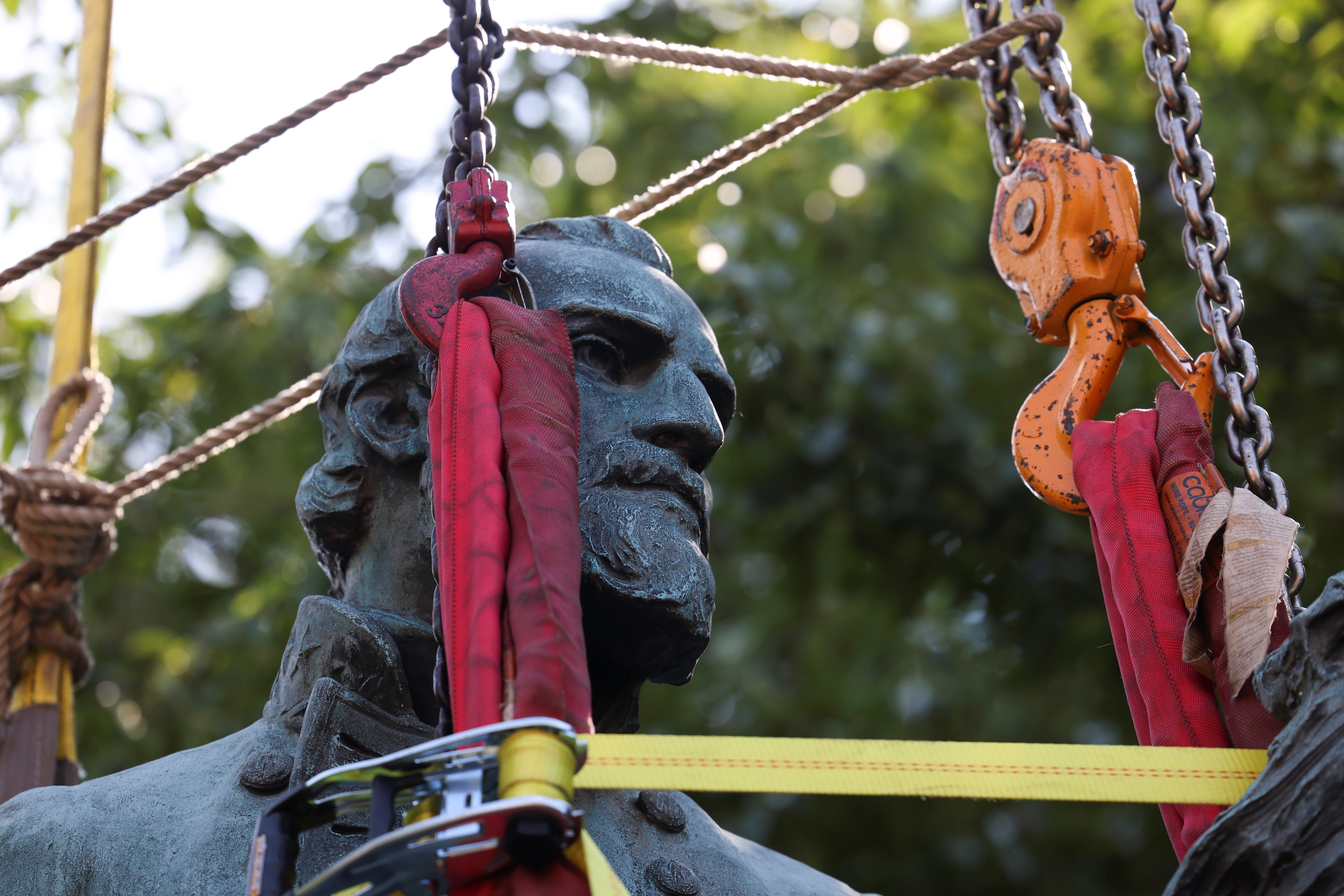 A statue of Confederate General Thomas "Stonewall" Jackson is removed, in Charlottesville