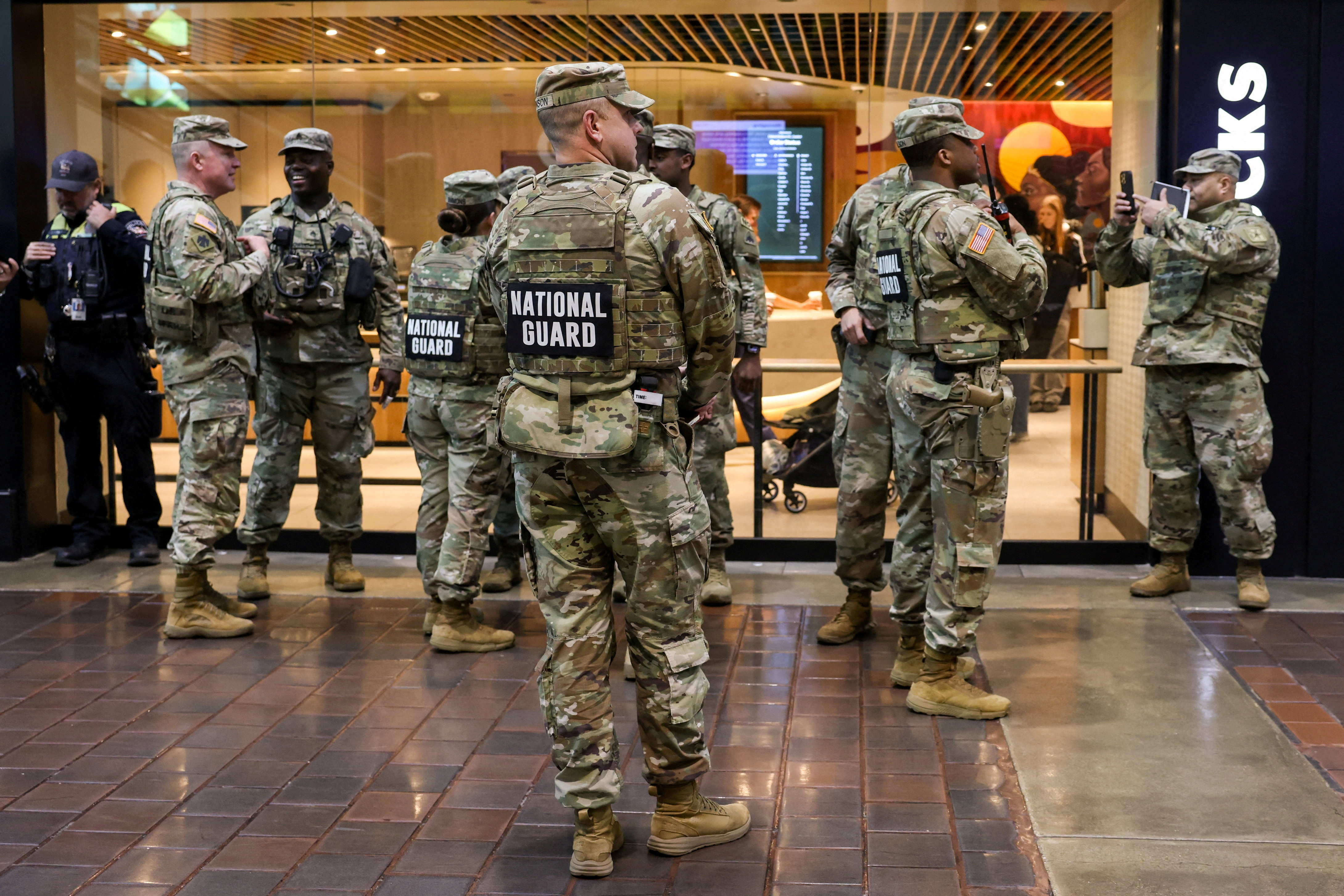 FILE PHOTO: Members of the National Guard stand at Union Station in Washington, D.C.