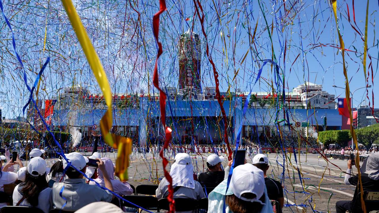 People gather to celebrate National Day at the Presidential Office Building, in Taipei