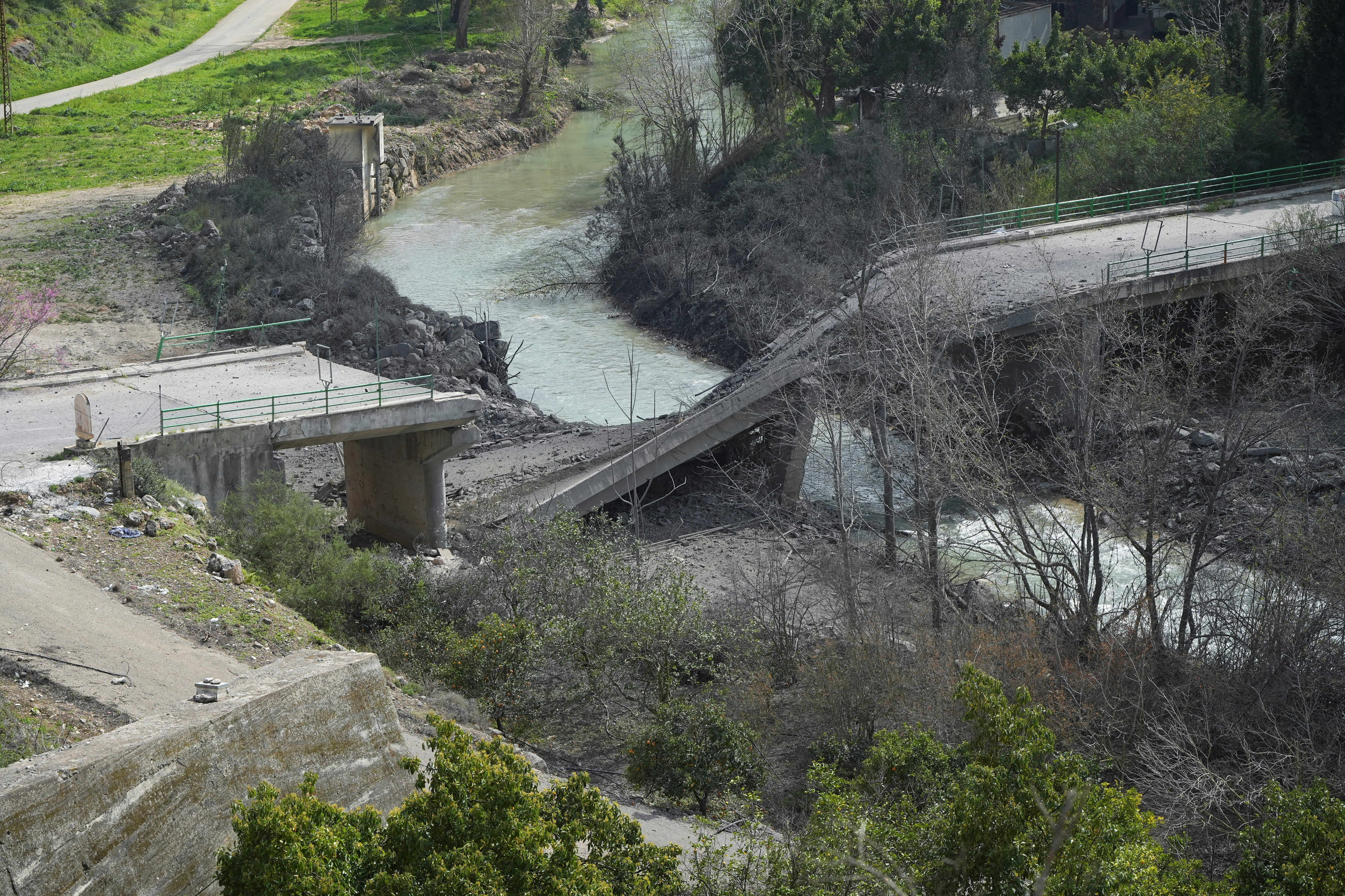 The damaged Zrarieh Bridge over the Litani river, after it was hit by an Israeli strike in Tayr Falsay