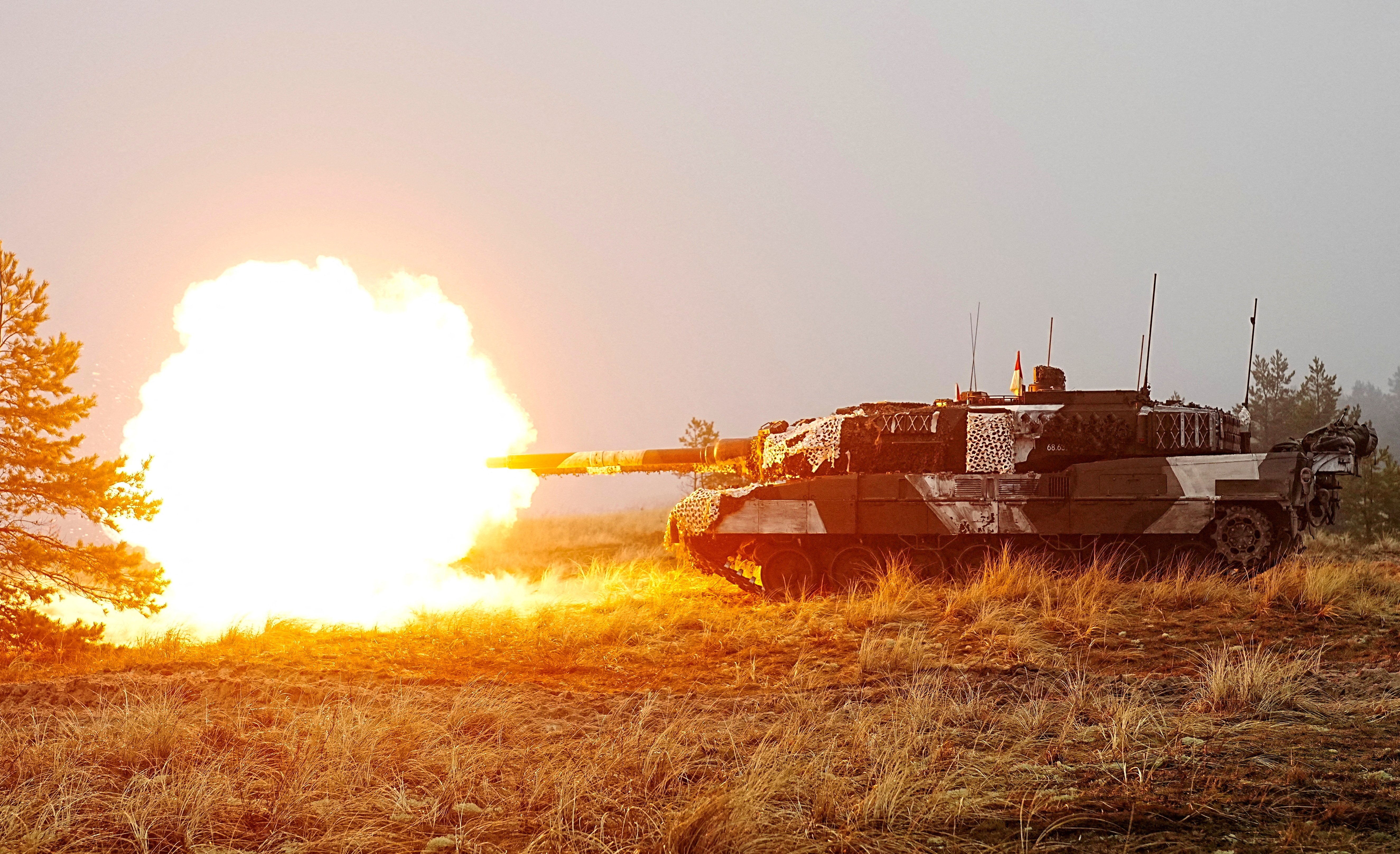 FILE PHOTO: Danish army Leopard 2A7 tanks and Estonian army CV-90 infantry fighting vehicles attend live shooting exercise in Perakula