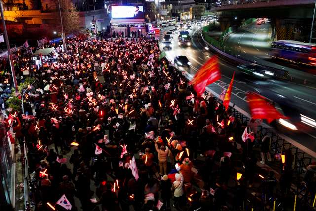 South Korean court issues arrest warrant for impeached President Yoon