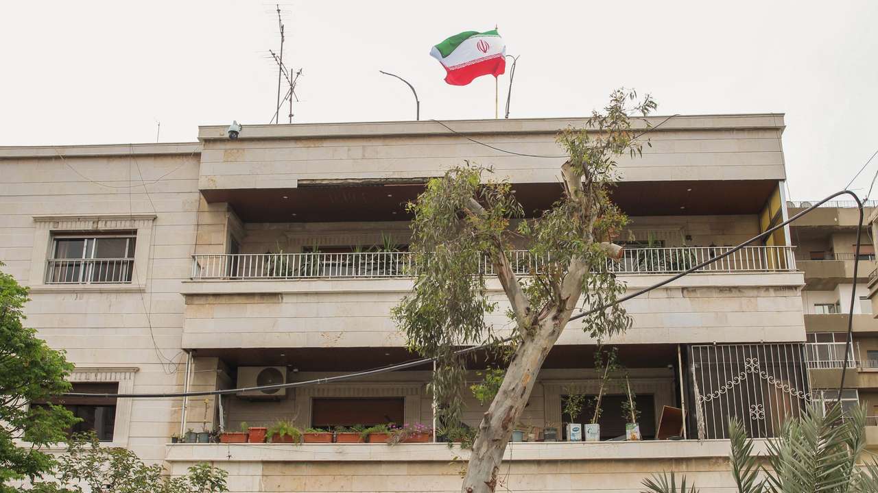 Iranian flag flutters on new Iranian consulate building after Iran's consulate in Damascus was targeted in a suspected Israeli attack on Monday April 1, in Damascus