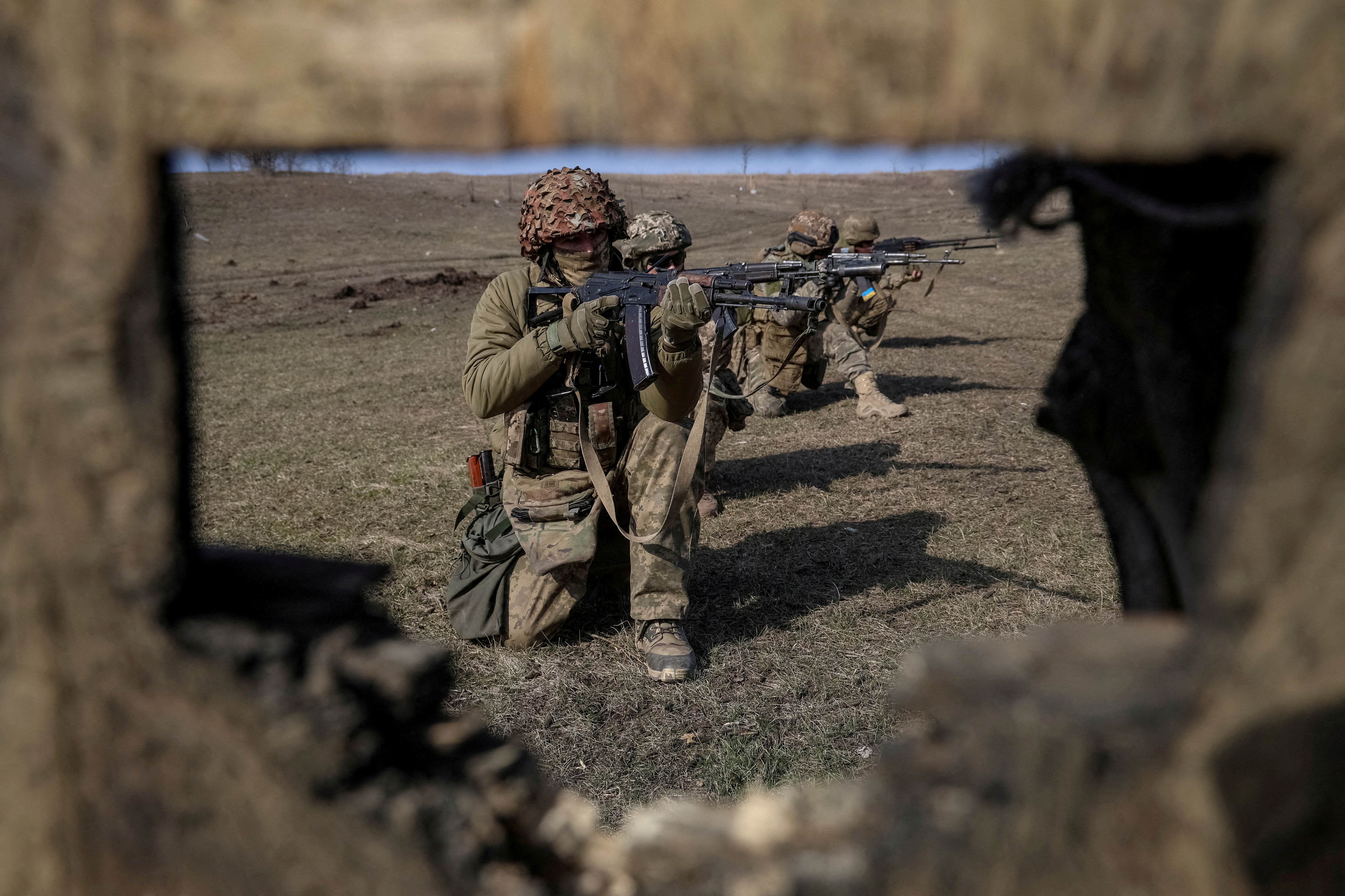 FILE PHOTO: Ukrainian servicemen take part in training in Donetsk region