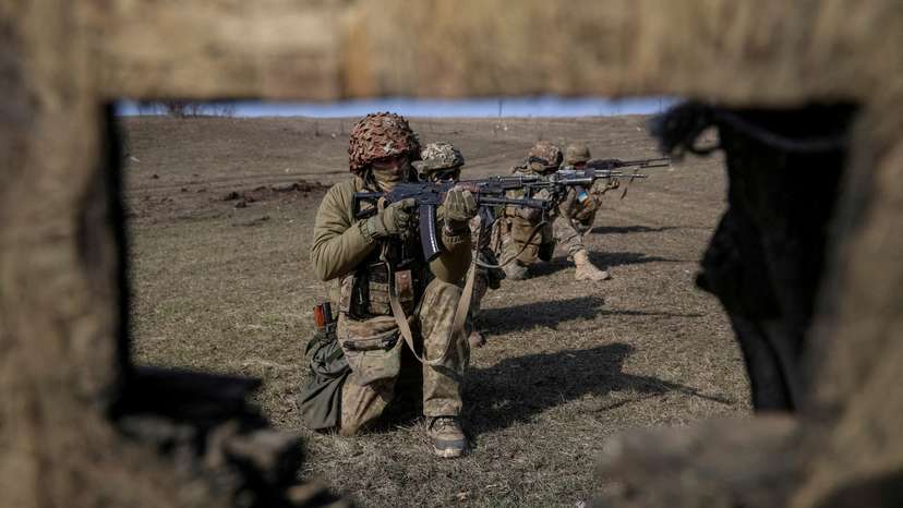 FILE PHOTO: Ukrainian servicemen take part in training in Donetsk region