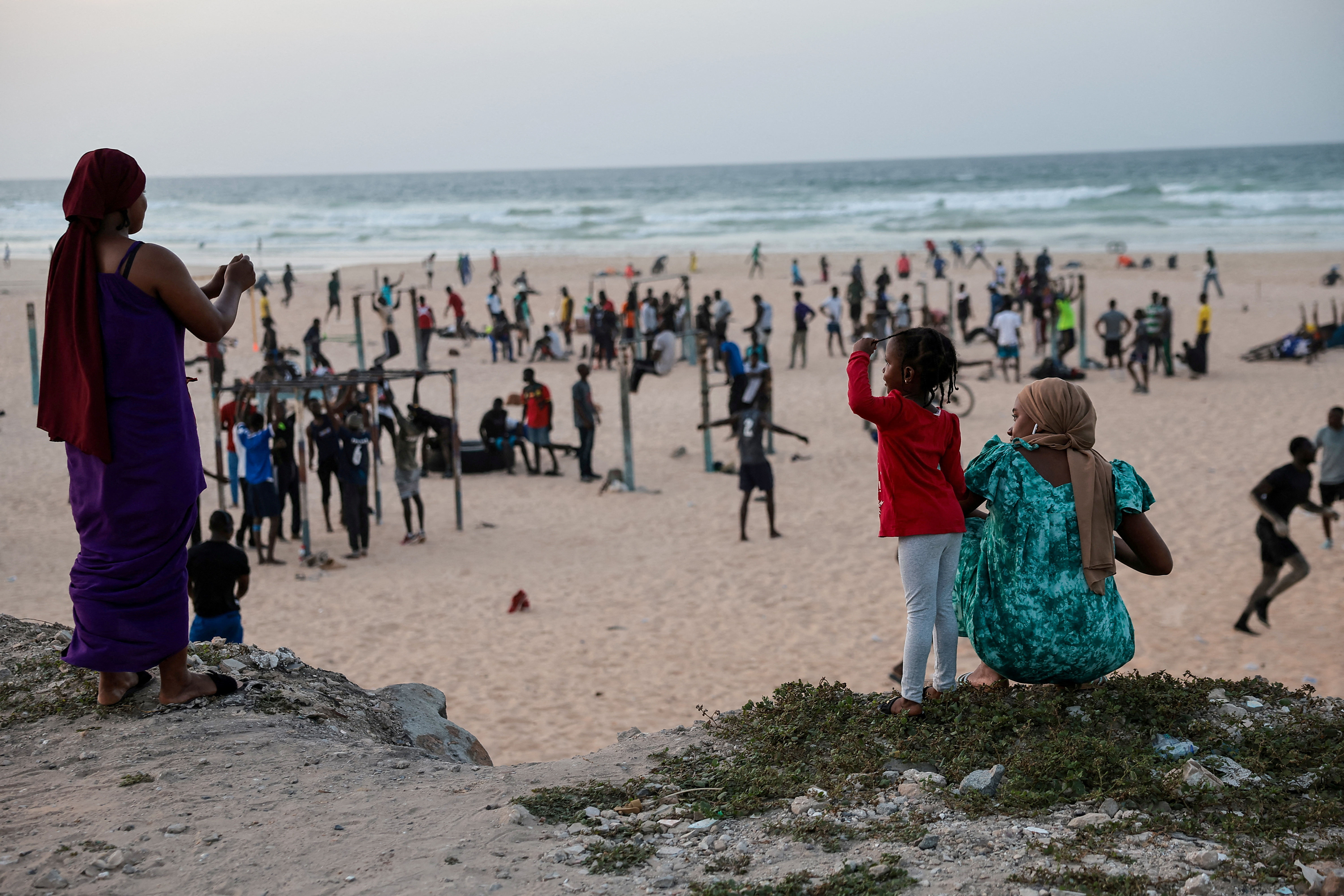 FILE PHOTO: People work out on the outskirts of Dakar