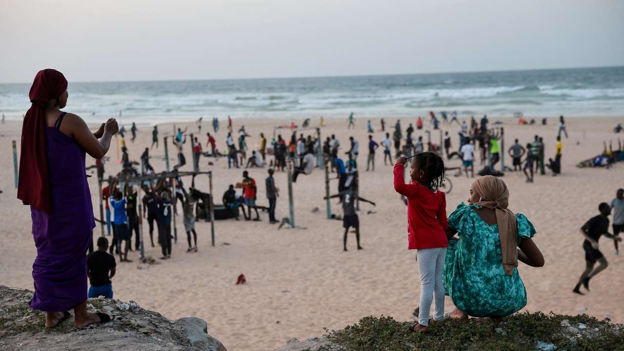 FILE PHOTO: People work out on the outskirts of Dakar