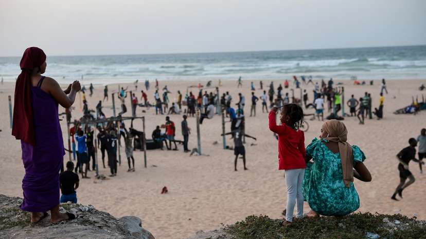 FILE PHOTO: People work out on the outskirts of Dakar