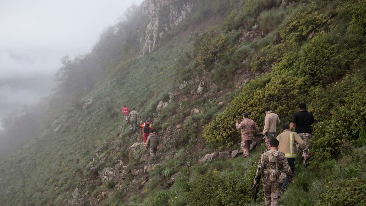 FILE PHOTO: FILE PHOTO: Rescue team works following a crash of a helicopter carrying Iran's President Ebrahim Raisi, in Varzaqan