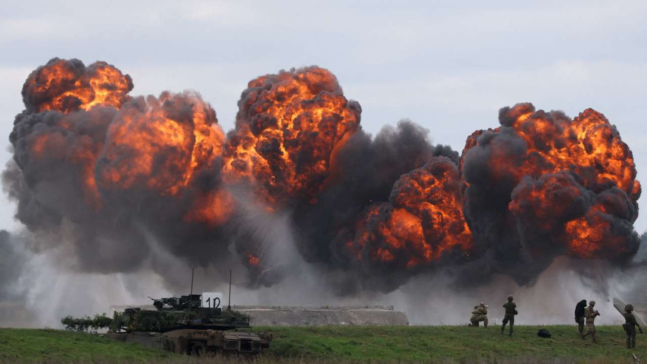 FILE PHOTO: Polish forces with NATO soldiers hold military exercises 'Iron Defender' at Orzysz training ground in Wierzbiny