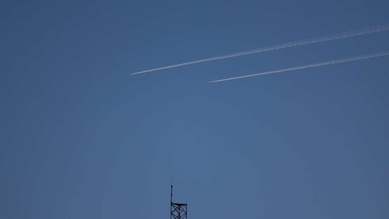 Israeli planes fly over Syria, as seen from the Israeli-occupied Golan Heights