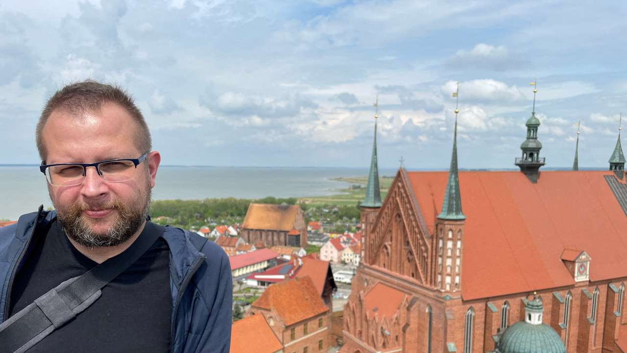 Belarusian opposition figure Anatol Kotau poses for a picture in Frombork