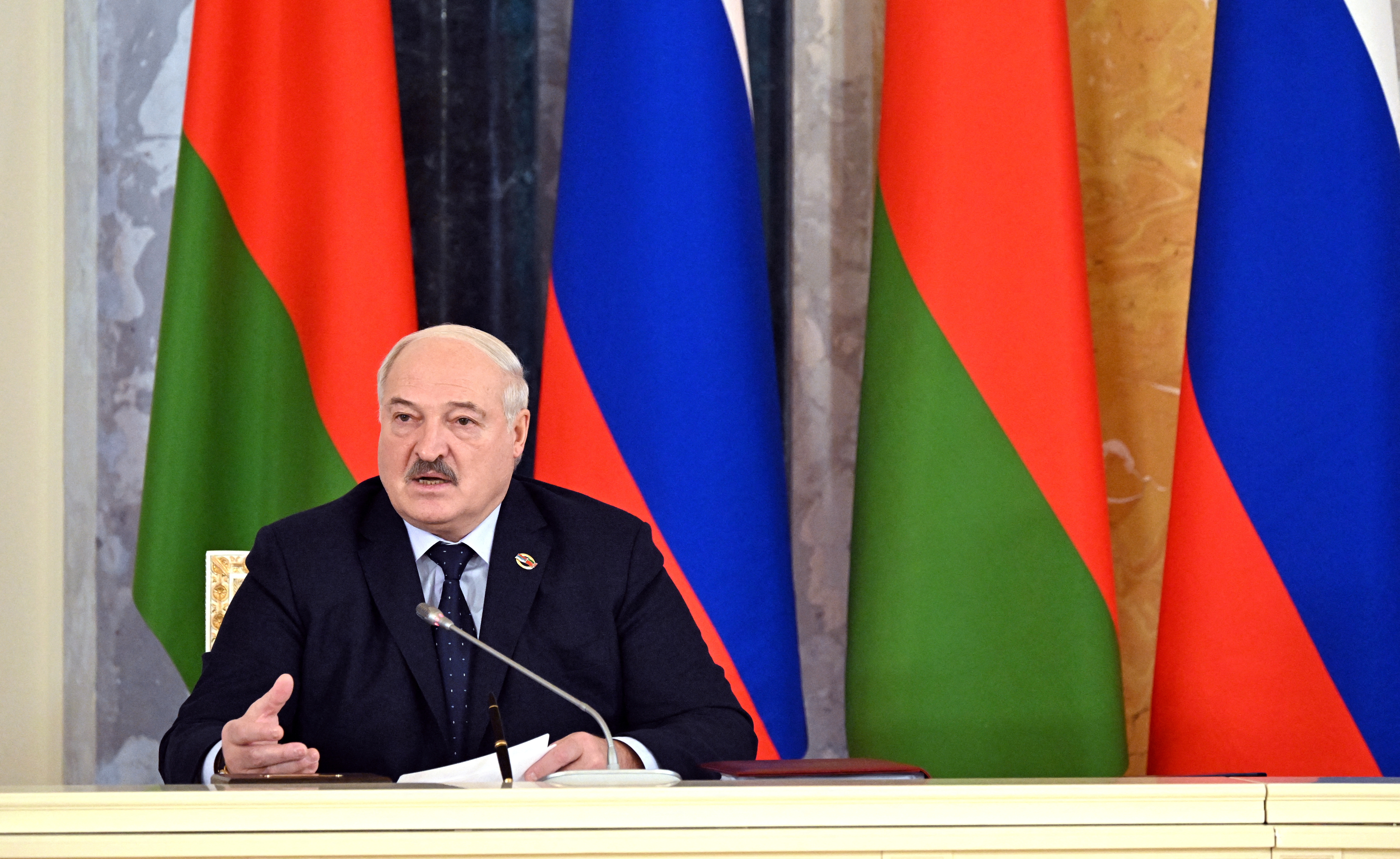 FILE PHOTO: Russian President Putin and Belarusian President Lukashenko chair Union State's Council meeting in St Petersburg
