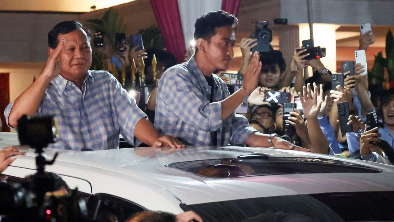 Indonesia's presidential candidate Prabowo Subianto greets his supporters in Jakarta