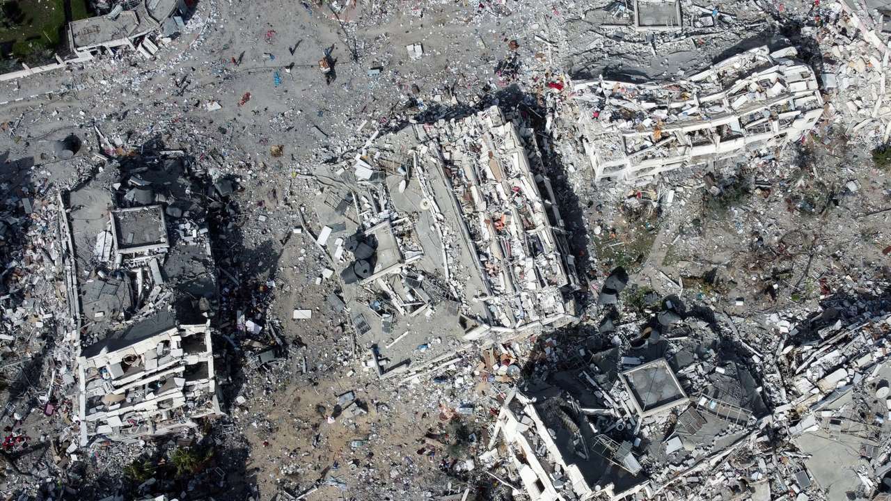 Residential buildings, destroyed in Israeli strikes during the conflict, lie in ruin, in Gaza City